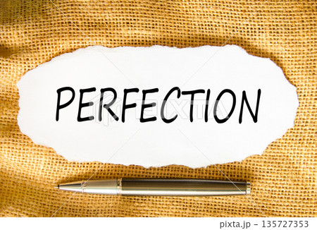 Perfection symbol. Concept word Perfection on beautiful white paper. Beautiful canvas background. Beautiful black pen. Business perfection concept. Copy space. Perfection symbol. Concept word Perfection on beautiful white paper. Beautiful canvas background. Beautiful black pen. Business perfection concept. Copy space. 135727353