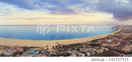 Panorama of Chaves beach with blue ocean luxury resort and sandy beach at sunset 135727515