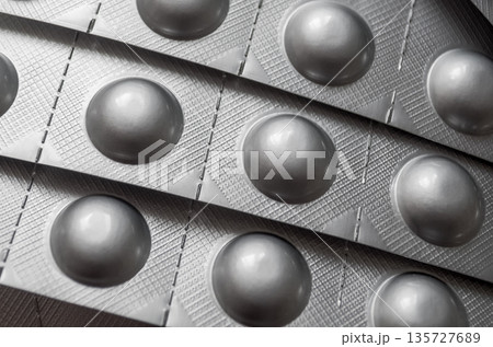 Close-up of pharmaceutical aluminum blister packs 135727689