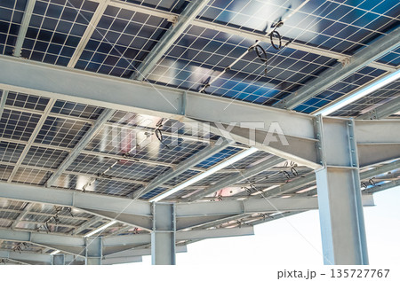 Solar panel installation in outdoor parking lot Solar panel installation in outdoor parking lot 135727767