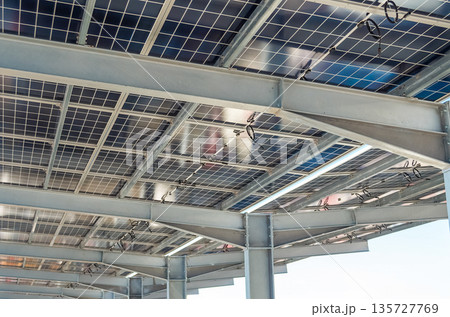 Solar panel installation in outdoor parking lot Solar panel installation in outdoor parking lot 135727769