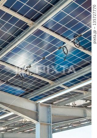 Solar panel installation in outdoor parking lot Solar panel installation in outdoor parking lot 135727770