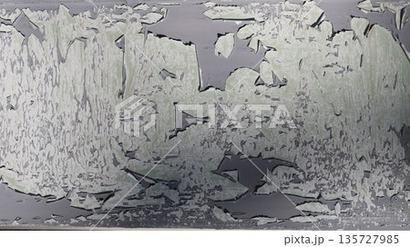 A weathered wall with peeling flaky film or paint or metallic coating, beautiful sunny old layered detailed texture, aged background with flaking coatings A weathered wall with peeling flaky film or paint or metallic coating, beautiful sunny old layered detailed texture, aged background with flaking coatings 135727985