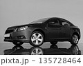 Black car on a gray background.  135728464