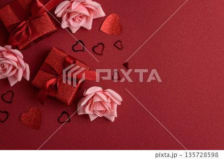 Glittery Red Gift Boxes with Satin Bows and Glittery Heart. Romantic Valentines Day Flatlay Glittery Red Gift Boxes with Satin Bows and Glittery Heart. Romantic Valentines Day Flatlay 135728598