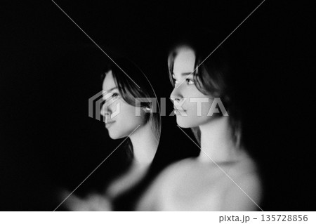 Womans abstract portrait double exposing ethereal concept Womans abstract portrait double exposing ethereal concept 135728856