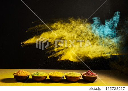 Spicy colorful powder explosion bursting from bowls Spicy colorful powder explosion bursting from bowls 135728927