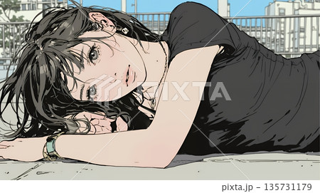 心地よさそうに地面に身を横たえる若い女性