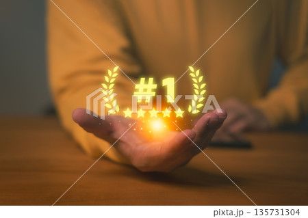 Customer holding glowing number one symbol with five stars, representing success, best quality, customer service, and top performance. Concept of achievement, excellence, and business recognition. 135731304