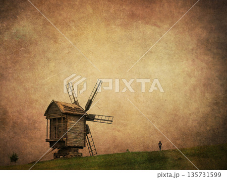 Vintage-style photo of an old wooden windmill on a grassy hill, adding textured overlay for an aged, nostalgic look A fairytale rural historical scene Vintage-style photo of an old wooden windmill on a grassy hill, adding textured overlay for an aged, nostalgic look A fairytale rural historical scene 135731599