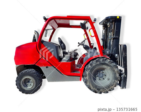A red all terrain forklift is shown, ready to perform heavy lifting on uneven surfaces. It is suitable for work at construction sites and remote areas, operating in various weather conditions. 135731665