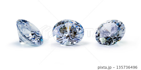 Beautiful Brilliant cut diamond held by tweezers on white background 135736496