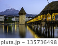 Historic city center of Lucerne with famous Chapel Bridge with blue sky and clouds, Canton of Lucerne, Switzerland 135736498