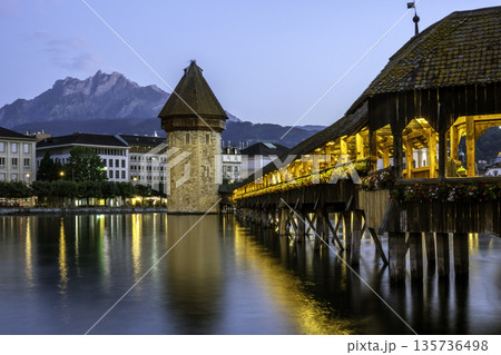 Historic city center of Lucerne with famous Chapel Bridge with blue sky and clouds, Canton of Lucerne, Switzerland 135736498