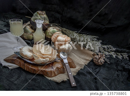 Peel toddy palm and fresh palm juice at front of dark background. Peel toddy palm and fresh palm juice at front of dark background. 135738801