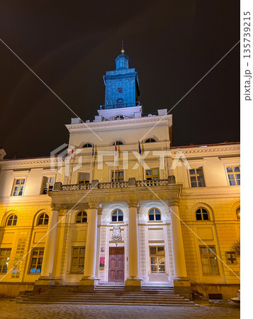 Historic building with tower and clock during winter, Lublin, Poland 135739215