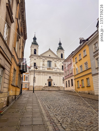 Church of the Holy Spirit, Warsaw stands in town square on a cloudy day 135739216