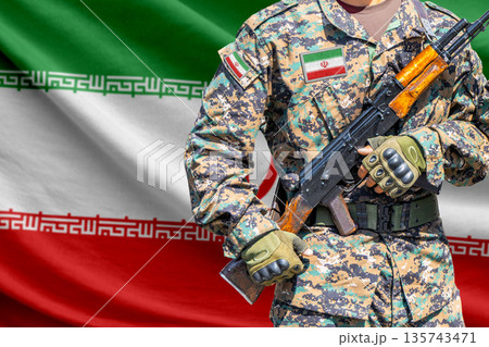 Iran flag with soldier holding assault rifle Iran flag with soldier holding assault rifle 135743471