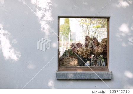 Fresh flower on basket decor on window at Kawaguchiko lake 135745710
