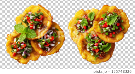 Colombia Patacones fried green plantains slices garnished with chopped onions, chili, and herbs isolated on white background 135748326