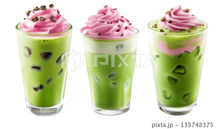 Iced matcha drink topped with pink whipped cream and chocolate bits, isolated on white transparent background 135748375