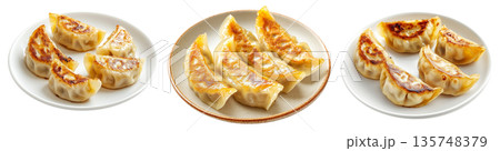 Golden pan-fried Japanese gyoza dumplings served on plate, isolated on white background, concept of Asian cuisine Golden pan-fried Japanese gyoza dumplings served on plate, isolated on white background, concept of Asian cuisine 135748379