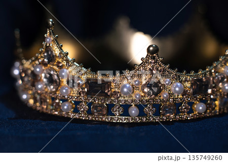Ancient golden medieval crown with gemstones. Ancient golden medieval crown with gemstones. 135749260