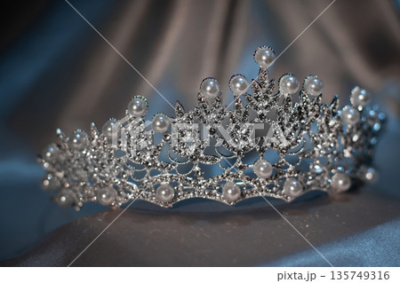 Pearl crown, royal golden diadem on grey background. Jewelry. 135749316