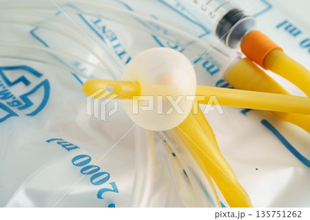 Foley catheter and urine drainage bag collect urine for disability or patient in hospital. Foley catheter and urine drainage bag collect urine for disability or patient in hospital. 135751262