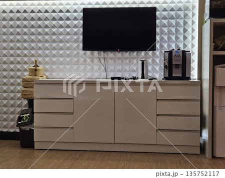 This is a console with television and cabinet 135752117