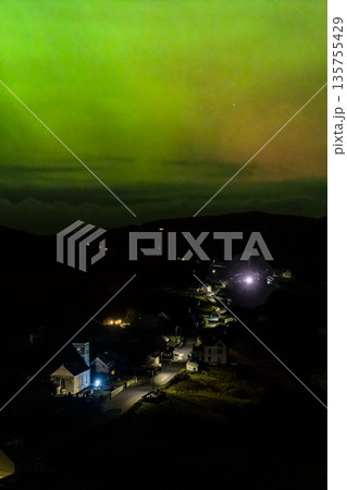 The Aurora Borealis, the northern lights, showing up above Portnoo in County Donegal, Ireland 135755429
