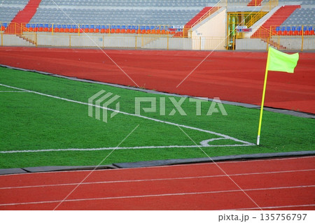 STADIUM - Football field with corner flag STADIUM - Football field with corner flag 135756797