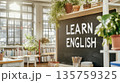 Airy sunlit classroom with chalkboard with text Learn English, educational concept 135759325