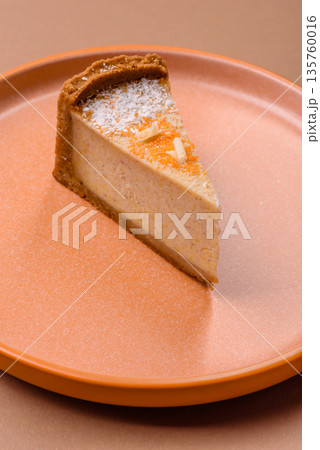 Cheesecake, a slice of sweet pie, a classic cheese dessert. Cheesecake as a food background Cheesecake, a slice of sweet pie, a classic cheese dessert. Cheesecake as a food background 135760016