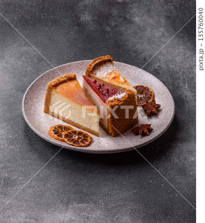 Cheesecake, a slice of sweet pie, a classic cheese dessert. Cheesecake as a food background 135760040