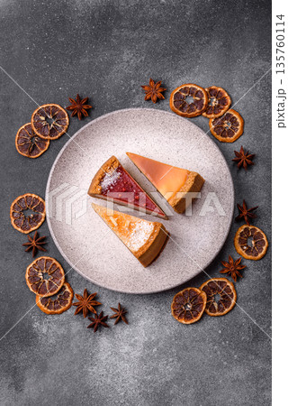 Cheesecake, a slice of sweet pie, a classic cheese dessert. Cheesecake as a food background 135760114