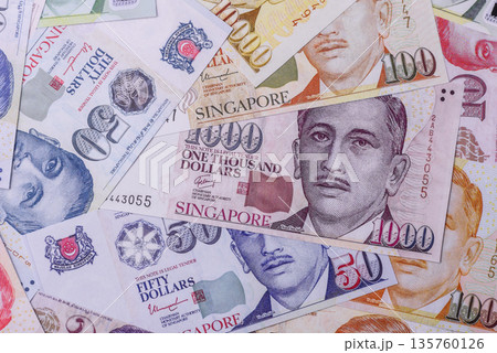 Money, currency of Singapore, dollar banknotes of various denominations. Singapore money Money, currency of Singapore, dollar banknotes of various denominations. Singapore money 135760126