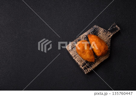 Chicken Kyiv cutlet with buttery filling, a lunch of chicken breast meat. Chicken Kyiv cutlet 135760447