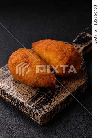 Chicken Kyiv cutlet with buttery filling, a lunch of chicken breast meat. Chicken Kyiv cutlet Chicken Kyiv cutlet with buttery filling, a lunch of chicken breast meat. Chicken Kyiv cutlet 135760453