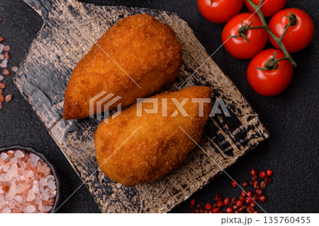 Chicken Kyiv cutlet with buttery filling, a lunch of chicken breast meat. Chicken Kyiv cutlet Chicken Kyiv cutlet with buttery filling, a lunch of chicken breast meat. Chicken Kyiv cutlet 135760455