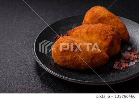 Chicken Kyiv cutlet with buttery filling, a lunch of chicken breast meat. Chicken Kyiv 135760466
