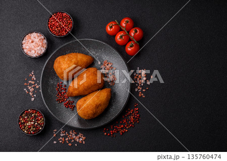 Chicken Kyiv cutlet with buttery filling, a lunch of chicken breast meat. Chicken Kyiv Chicken Kyiv cutlet with buttery filling, a lunch of chicken breast meat. Chicken Kyiv 135760474