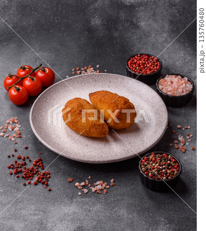 Chicken Kyiv cutlet with buttery filling, a lunch of chicken breast meat. Chicken Kyiv Chicken Kyiv cutlet with buttery filling, a lunch of chicken breast meat. Chicken Kyiv 135760480