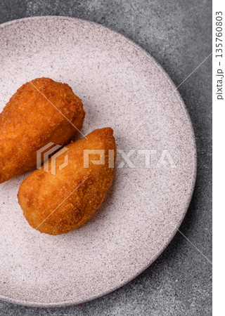 Chicken Kyiv cutlet with buttery filling, a lunch of chicken breast meat. Chicken Kyiv 135760803