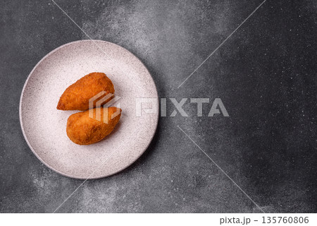 Chicken Kyiv cutlet with buttery filling, a lunch of chicken breast meat. Chicken Kyiv 135760806