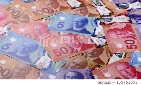 Money, currency of Canada, dollar banknotes of various denominations. Canadian money 135761055