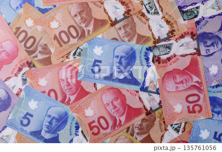 Money, currency of Canada, dollar banknotes of various denominations. Canadian money 135761056