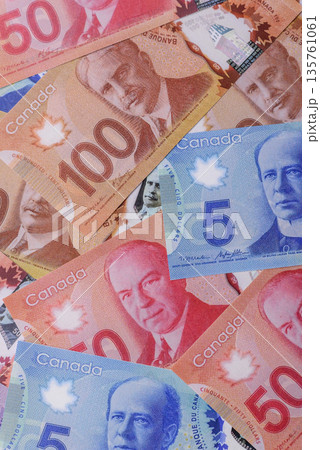 Money, currency of Canada, dollar banknotes of various denominations. Canadian money 135761061