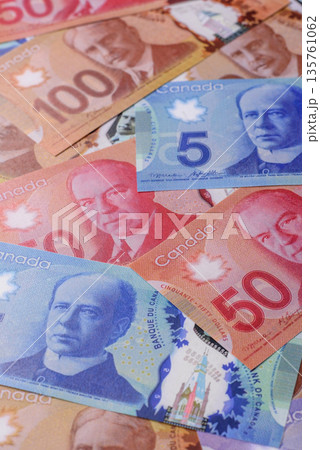 Money, currency of Canada, dollar banknotes of various denominations. Canadian money 135761062