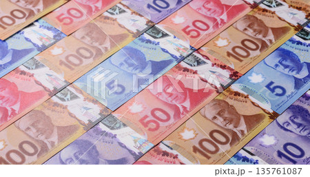 Money, currency of Canada, dollar banknotes of various denominations. Canadian money 135761087